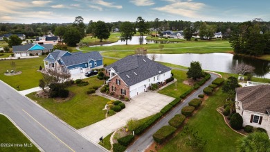 Incredible pond and golf course views await you in this 3 on Brunswick Plantation and Golf Resorts in North Carolina - for sale on GolfHomes.com, golf home, golf lot