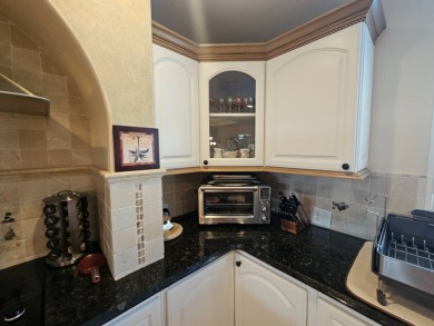 This home is located on leased land in a 55+ resort-style MH on Big Cypress Golf and Country Club in Florida - for sale on GolfHomes.com, golf home, golf lot