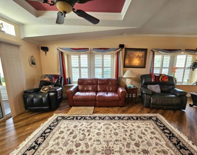 This home is located on leased land in a 55+ resort-style MH on Big Cypress Golf and Country Club in Florida - for sale on GolfHomes.com, golf home, golf lot