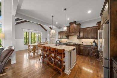 Experience elegance and timeless craftsmanship in this on Heritage Park Golf Course in Kansas - for sale on GolfHomes.com, golf home, golf lot