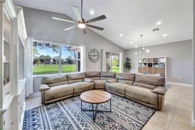 Enjoy sparkling lake and serene golf course views in this on Valencia Golf and Country Club in Florida - for sale on GolfHomes.com, golf home, golf lot