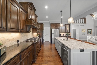 Experience elegance and timeless craftsmanship in this on Heritage Park Golf Course in Kansas - for sale on GolfHomes.com, golf home, golf lot