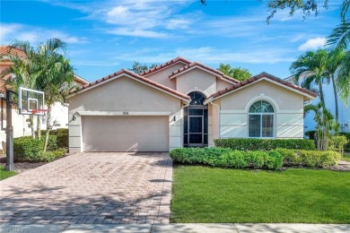 Enjoy sparkling lake and serene golf course views in this on Valencia Golf and Country Club in Florida - for sale on GolfHomes.com, golf home, golf lot