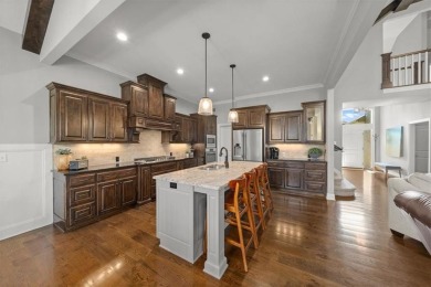 Experience elegance and timeless craftsmanship in this on Heritage Park Golf Course in Kansas - for sale on GolfHomes.com, golf home, golf lot