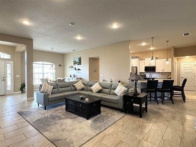 Situated within the desirable gated community of Summercrest on Baseline Golf Course in Florida - for sale on GolfHomes.com, golf home, golf lot