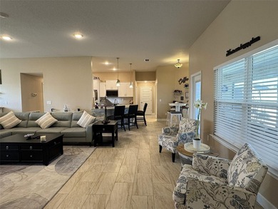 Situated within the desirable gated community of Summercrest on Baseline Golf Course in Florida - for sale on GolfHomes.com, golf home, golf lot