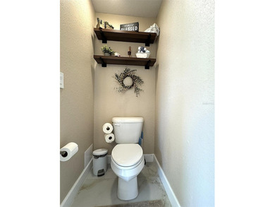 Situated within the desirable gated community of Summercrest on Baseline Golf Course in Florida - for sale on GolfHomes.com, golf home, golf lot