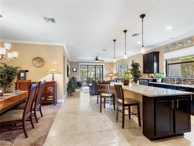 This two-bedroom plus den saltwater pool home in Bridgetown at on The Plantation Golf and Country Club in Florida - for sale on GolfHomes.com, golf home, golf lot