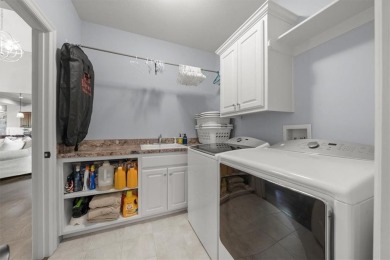 Experience elegance and timeless craftsmanship in this on Heritage Park Golf Course in Kansas - for sale on GolfHomes.com, golf home, golf lot