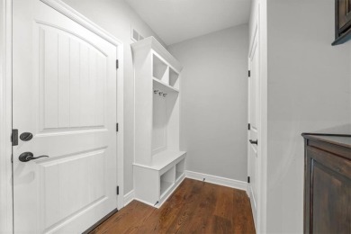 Experience elegance and timeless craftsmanship in this on Heritage Park Golf Course in Kansas - for sale on GolfHomes.com, golf home, golf lot