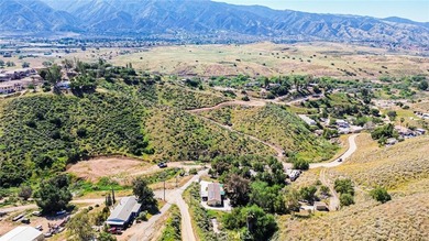Perched atop a scenic hillside in the highly desirable Temescal on Glen Ivy Golf Club in California - for sale on GolfHomes.com, golf home, golf lot