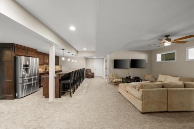 Experience elegance and timeless craftsmanship in this on Heritage Park Golf Course in Kansas - for sale on GolfHomes.com, golf home, golf lot
