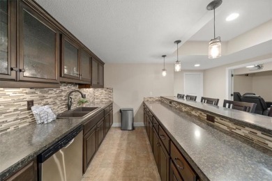 Experience elegance and timeless craftsmanship in this on Heritage Park Golf Course in Kansas - for sale on GolfHomes.com, golf home, golf lot