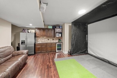 Experience elegance and timeless craftsmanship in this on Heritage Park Golf Course in Kansas - for sale on GolfHomes.com, golf home, golf lot