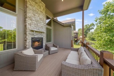 Experience elegance and timeless craftsmanship in this on Heritage Park Golf Course in Kansas - for sale on GolfHomes.com, golf home, golf lot