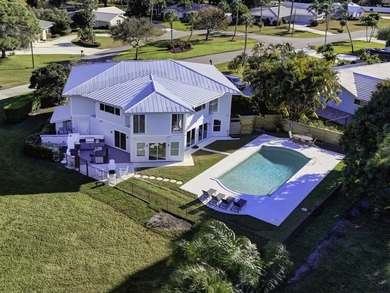 This One of a Kind Fully Renovated 5 Bedroom, 4 Bath Pool Home on BallenIsles Golf and Country Club in Florida - for sale on GolfHomes.com, golf home, golf lot