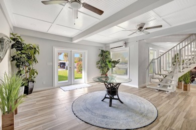 This One of a Kind Fully Renovated 5 Bedroom, 4 Bath Pool Home on BallenIsles Golf and Country Club in Florida - for sale on GolfHomes.com, golf home, golf lot