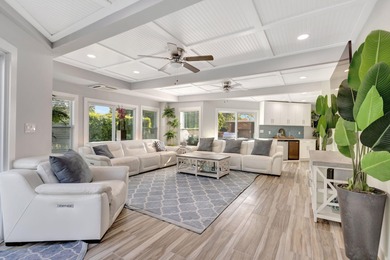 This One of a Kind Fully Renovated 5 Bedroom, 4 Bath Pool Home on BallenIsles Golf and Country Club in Florida - for sale on GolfHomes.com, golf home, golf lot