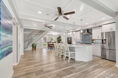 This One of a Kind Fully Renovated 5 Bedroom, 4 Bath Pool Home on BallenIsles Golf and Country Club in Florida - for sale on GolfHomes.com, golf home, golf lot