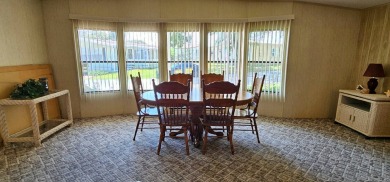 Furnished, spacious 2 bedroom 2 bath home in 55 + Resort style on Zephyrhills Municipal Golf Course in Florida - for sale on GolfHomes.com, golf home, golf lot