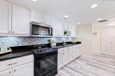 Back on the market with a NEW PRICE, A NEW LOOK AND A BEAUTIFUL on Isla Del Sol Yacht and Country Club in Florida - for sale on GolfHomes.com, golf home, golf lot