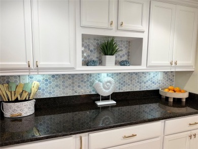 Back on the market with a NEW PRICE, A NEW LOOK AND A BEAUTIFUL on Isla Del Sol Yacht and Country Club in Florida - for sale on GolfHomes.com, golf home, golf lot