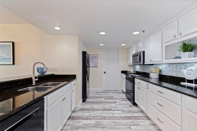 Back on the market with a NEW PRICE, A NEW LOOK AND A BEAUTIFUL on Isla Del Sol Yacht and Country Club in Florida - for sale on GolfHomes.com, golf home, golf lot