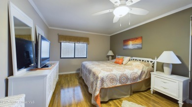 3rd FLOOR CORNER UNIT WITH 2 BALCONIES AN 2 DEEDED PARKING on Manatee Cove Golf Course in Florida - for sale on GolfHomes.com, golf home, golf lot