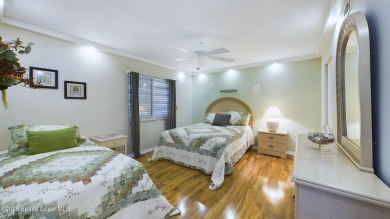 3rd FLOOR CORNER UNIT WITH 2 BALCONIES AN 2 DEEDED PARKING on Manatee Cove Golf Course in Florida - for sale on GolfHomes.com, golf home, golf lot