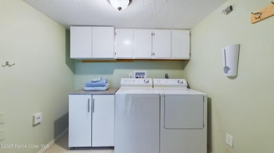 3rd FLOOR CORNER UNIT WITH 2 BALCONIES AN 2 DEEDED PARKING on Manatee Cove Golf Course in Florida - for sale on GolfHomes.com, golf home, golf lot