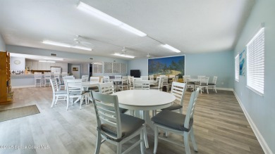 3rd FLOOR CORNER UNIT WITH 2 BALCONIES AN 2 DEEDED PARKING on Manatee Cove Golf Course in Florida - for sale on GolfHomes.com, golf home, golf lot