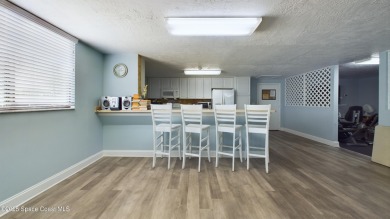 3rd FLOOR CORNER UNIT WITH 2 BALCONIES AN 2 DEEDED PARKING on Manatee Cove Golf Course in Florida - for sale on GolfHomes.com, golf home, golf lot