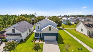 Relax and unwind while watching sunsets from your charming front on Holiday Golf Club in Florida - for sale on GolfHomes.com, golf home, golf lot