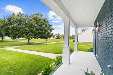 Relax and unwind while watching sunsets from your charming front on Holiday Golf Club in Florida - for sale on GolfHomes.com, golf home, golf lot