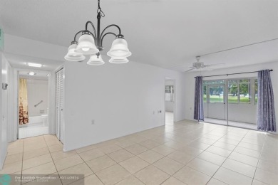 Resort-style living can be yours in the beautiful community of on Wynmoor Golf Course in Florida - for sale on GolfHomes.com, golf home, golf lot