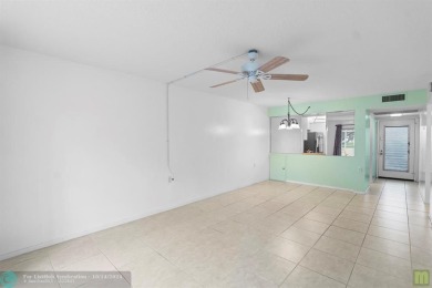 Resort-style living can be yours in the beautiful community of on Wynmoor Golf Course in Florida - for sale on GolfHomes.com, golf home, golf lot