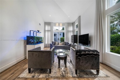 Rarely available two-story pool home with garage in gated on Turnberry Isle Resort and Club in Florida - for sale on GolfHomes.com, golf home, golf lot