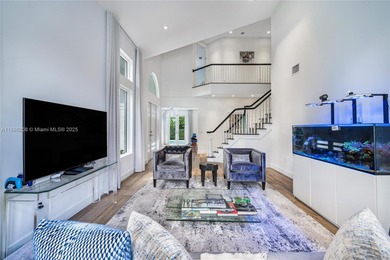 Rarely available two-story pool home with garage in gated on Turnberry Isle Resort and Club in Florida - for sale on GolfHomes.com, golf home, golf lot