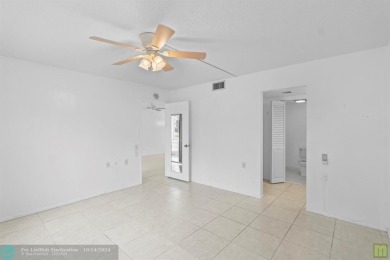 Resort-style living can be yours in the beautiful community of on Wynmoor Golf Course in Florida - for sale on GolfHomes.com, golf home, golf lot