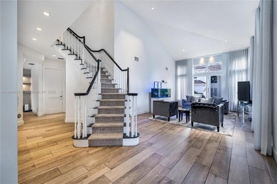 Rarely available two-story pool home with garage in gated on Turnberry Isle Resort and Club in Florida - for sale on GolfHomes.com, golf home, golf lot