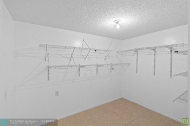 Resort-style living can be yours in the beautiful community of on Wynmoor Golf Course in Florida - for sale on GolfHomes.com, golf home, golf lot