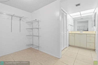Resort-style living can be yours in the beautiful community of on Wynmoor Golf Course in Florida - for sale on GolfHomes.com, golf home, golf lot