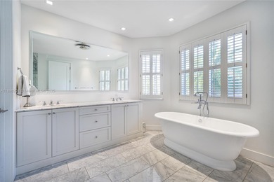 Rarely available two-story pool home with garage in gated on Turnberry Isle Resort and Club in Florida - for sale on GolfHomes.com, golf home, golf lot