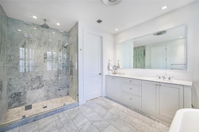 Rarely available two-story pool home with garage in gated on Turnberry Isle Resort and Club in Florida - for sale on GolfHomes.com, golf home, golf lot