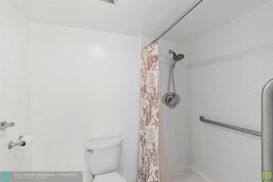 Resort-style living can be yours in the beautiful community of on Wynmoor Golf Course in Florida - for sale on GolfHomes.com, golf home, golf lot
