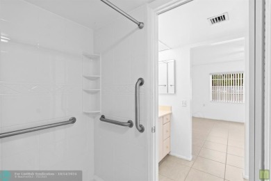 Resort-style living can be yours in the beautiful community of on Wynmoor Golf Course in Florida - for sale on GolfHomes.com, golf home, golf lot