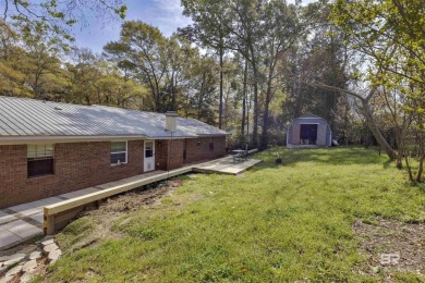 MOTIVATED SELLER! Welcome to this beautifully remodeled home on Lake Forest Yacht and Country Club in Alabama - for sale on GolfHomes.com, golf home, golf lot