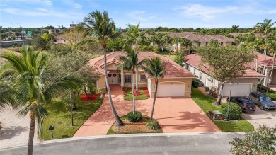 Welcome home to your  beautiful well kept 5 bedroom and 3 bath on Lago Mar Country Club in Florida - for sale on GolfHomes.com, golf home, golf lot