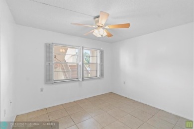 Resort-style living can be yours in the beautiful community of on Wynmoor Golf Course in Florida - for sale on GolfHomes.com, golf home, golf lot