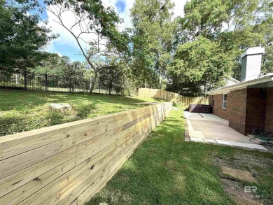 MOTIVATED SELLER! Welcome to this beautifully remodeled home on Lake Forest Yacht and Country Club in Alabama - for sale on GolfHomes.com, golf home, golf lot